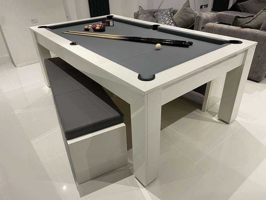 Pool table turns top into dining table