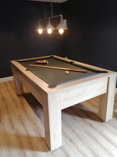 Load image into Gallery viewer, Vintage oak pool table with green felt in a cozy game room setup.