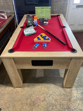 Load image into Gallery viewer, Nebraska Oak pool table with red felt and accessories displayed on top.