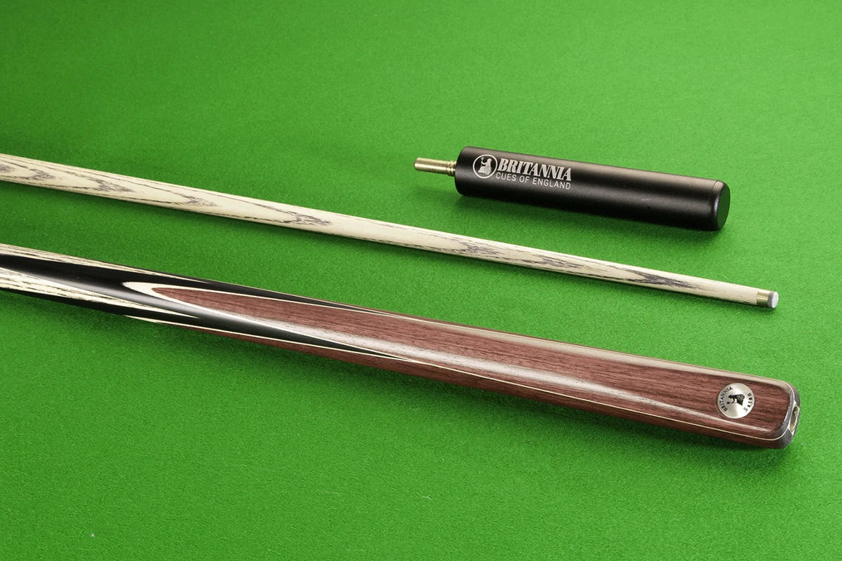 Satan Britannia 8 Ball Pro Cue two-piece with sleek wood finish on green felt.