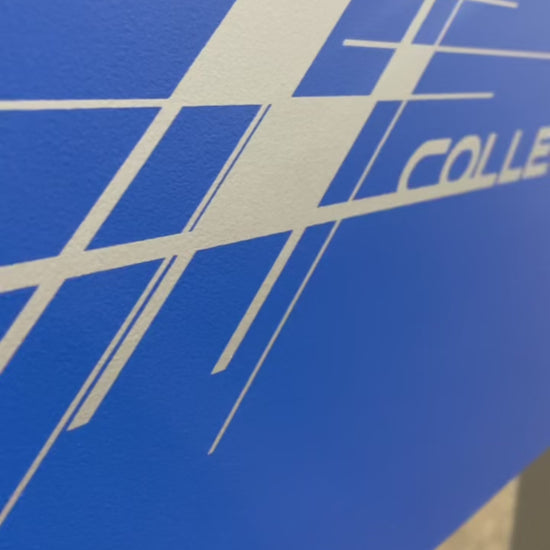 Close-up of Roberto Sport College Pro branding with sleek blue and white design.
