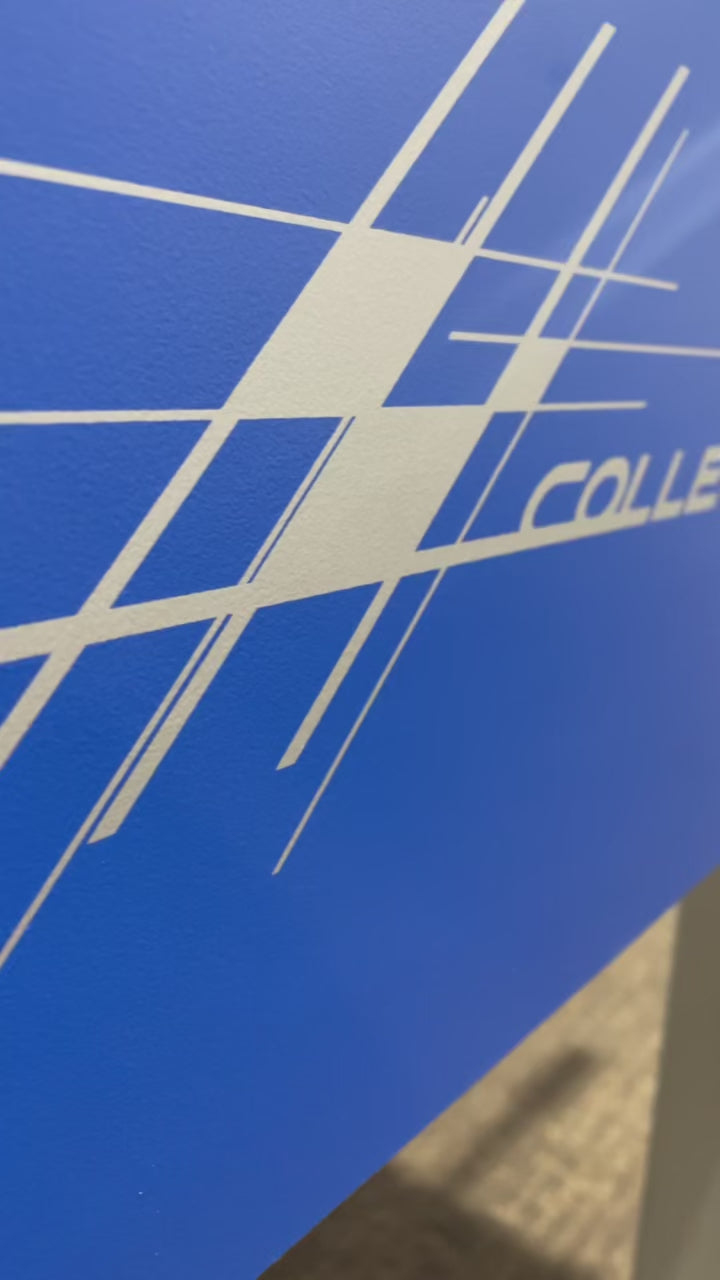 Close-up of Roberto Sport College Pro branding with sleek blue and white design.