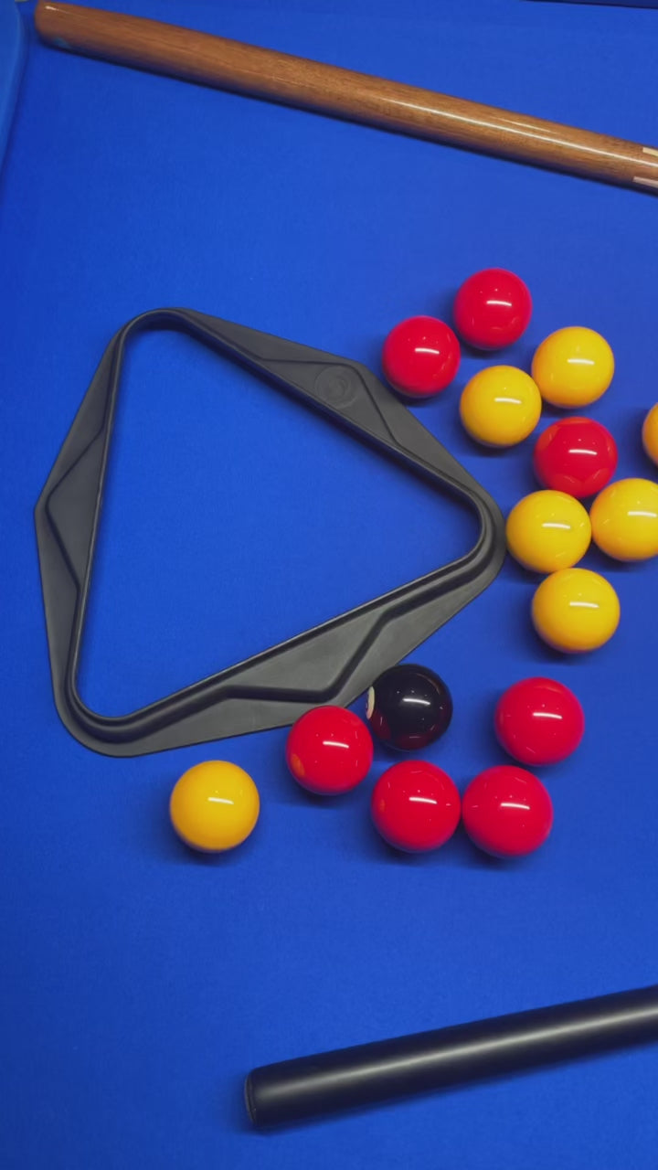 Aramith red and yellow pool balls with a black triangle rack on a blue table.