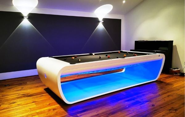 Modern Blacklight pool table with white frame and blue LED lighting.