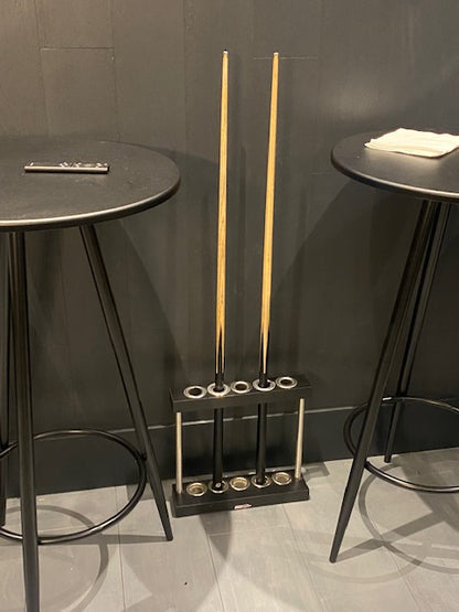 Black Superpool Match Cue Stand with 3 cues, compact and modern.