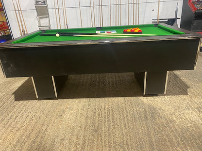 Side view of Superpool Black Pearl pool table with green felt and black finish.