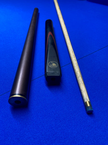 Cannon Viper 3 Piece 57-inch cue parts laid out on blue surface.