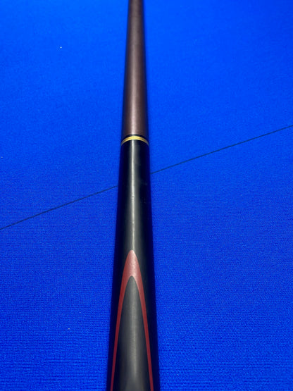 Close-up of Cannon Viper 3 Piece 57-inch cue handle on blue surface.