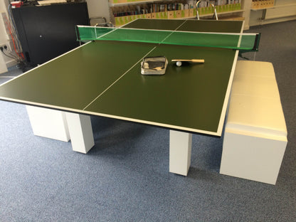 8' x 4' table tennis top on a table with net, paddle, and ball setup.