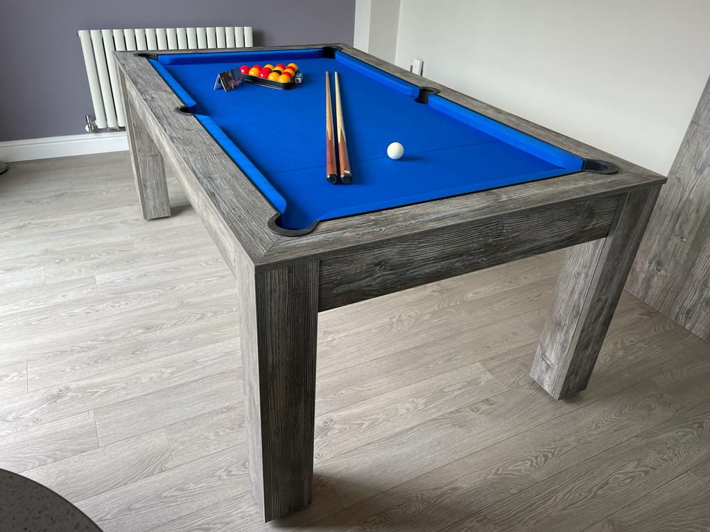 Rustic Rosetta pool dining table with blue felt and weathered wood finish.