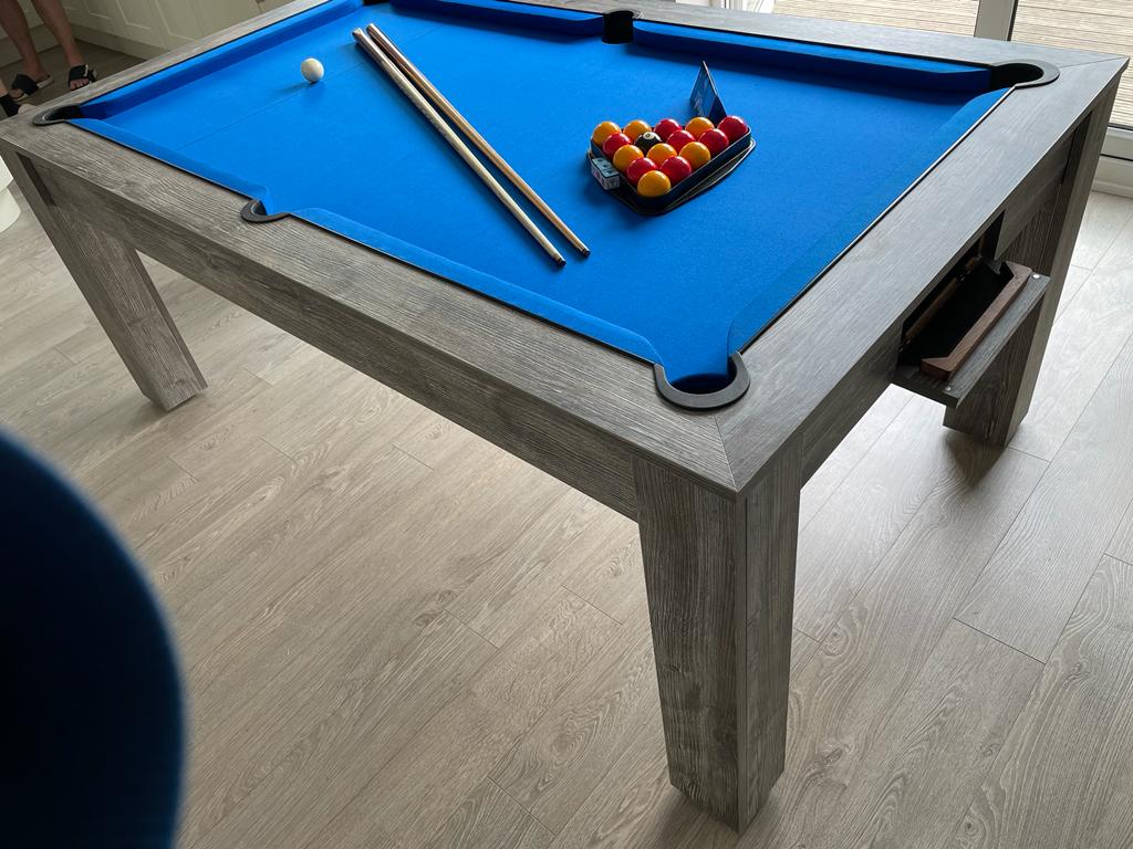 Grey Pine Rosetta pool dining table with blue felt and pool balls arranged.