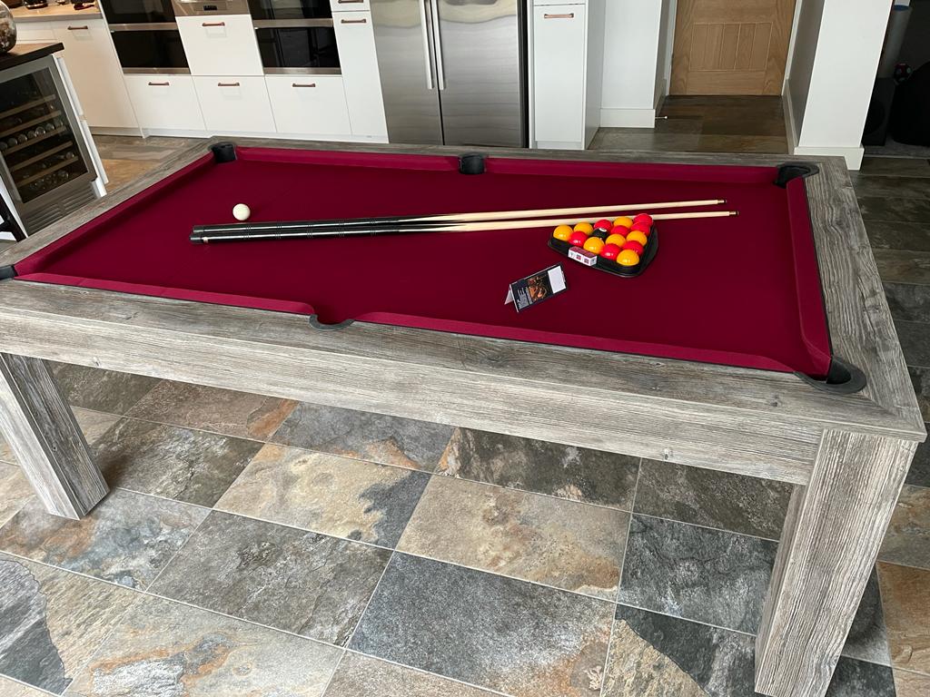 Grey Pine Rosetta pool dining table with red felt and pool accessories.