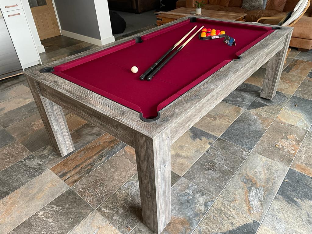 Rustic Rosetta pool dining table with red felt and weathered wood finish.