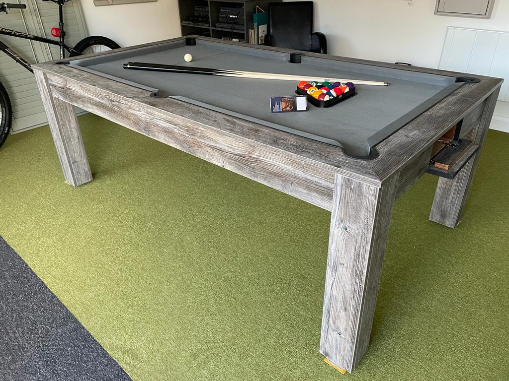Grey Pine Rosetta pool dining table with grey felt and pool equipment.