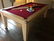 Load image into Gallery viewer, Supreme Oak Classic Diner pool table with red felt in a rustic room.