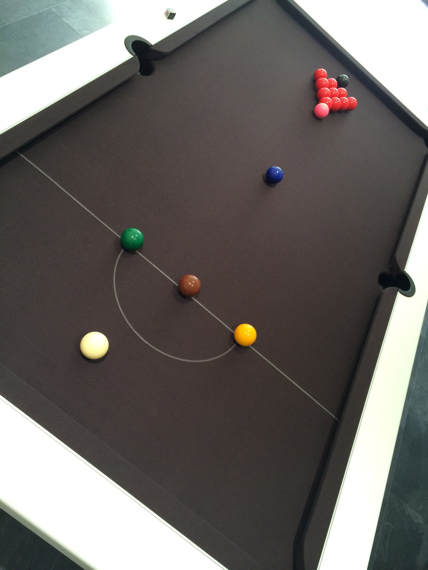 a pool table with balls on it