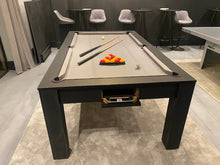 Load image into Gallery viewer, Matt Black Rosetta pool dining table with cues and balls in a stylish room.
