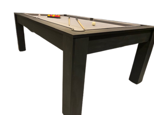 Matt Black Rosetta pool dining table with cues and balls on a grey surface.