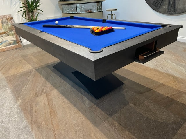 Close-up of Monaco Grey Lightning pool diner table with blue felt and accessories.