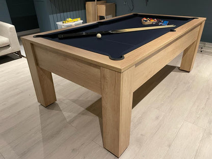 Nebraska Oak vintage pool table with blue felt in a modern room setting.