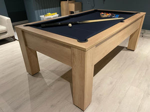 Nebraska Oak vintage pool table with blue felt in a modern room setting.