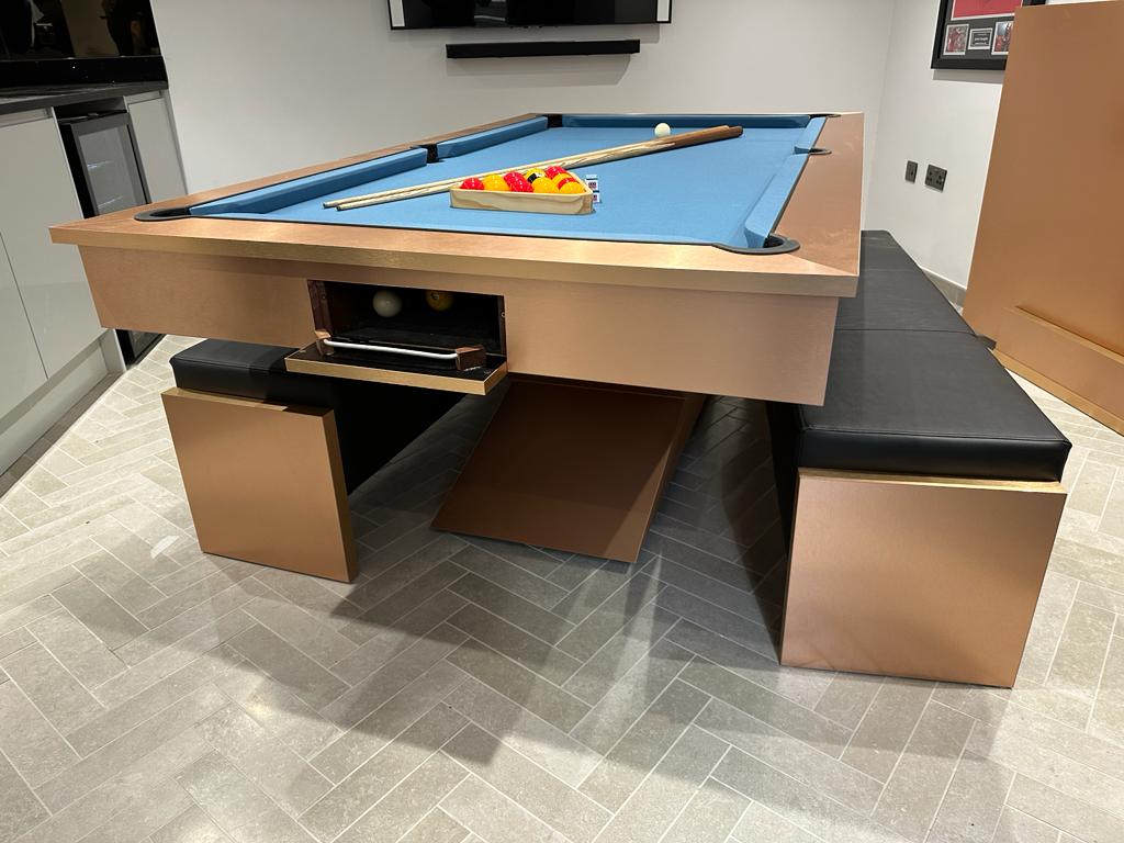 Brushed copper pool diner table with storage drawer and blue felt top.