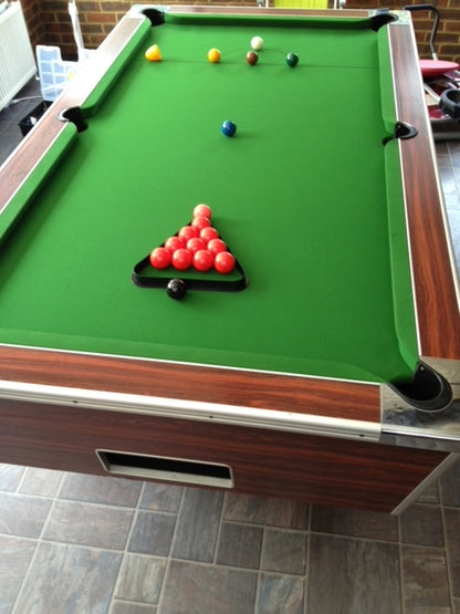 Reconditioned 7' x 4' Rosewood Superleague pool table with green felt and triangle setup.