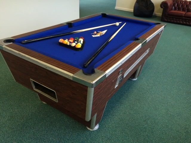 Reconditioned 7' x 4' Rosewood Superleague pool table with blue felt and free play setup.