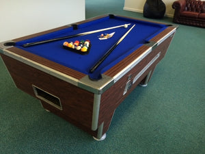 Reconditioned 7' x 4' Rosewood Superleague pool table with blue felt and free play setup.