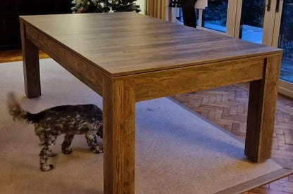 Santa Fe Walnut Rosetta dining table configuration with a dog underneath.